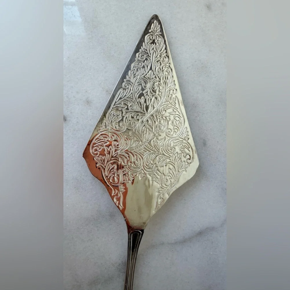 vintage silver-plated pie or cake server, frequently produced in Italy